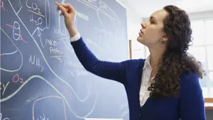 Cute Teacher On Board Wallpaper