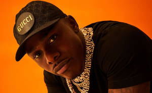 Dababy In Orange Wallpaper