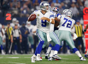 Dallas Cowboys Logo On Helmet Of Player Wallpaper