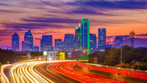 Dallas Skyline Yellow And Orange Lights Wallpaper