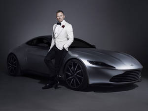 Daniel Craig With Sports Car Wallpaper