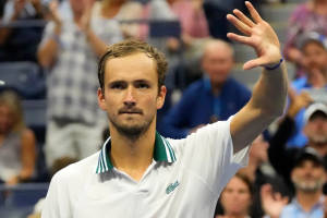 Daniil Medvedev Strikes A Powerful Pose On The Court Wallpaper