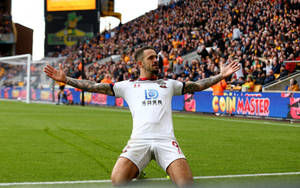 Danny Ings Celebrating On Knees Wallpaper