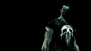 Daring And Powerful Punisher Logo On T-shirt Wallpaper