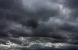 Dark And Light - A Contrasting View Of A Puffy Cloud Wallpaper