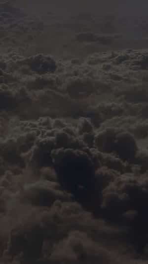 Dark And Menacing Black Clouds Above The Horizon. Wallpaper