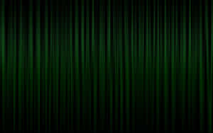 Dark Green Grunge With A Glow Of Green In The Background Wallpaper