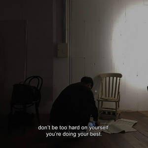 Dark Lit Room With Quote Wallpaper