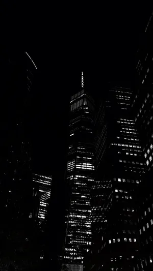 Dark Night View Of Tall Buildings Wallpaper