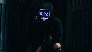 Dark Ominous Clouds Hovering High Above A Barren Landscape Wallpaper