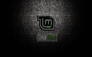 Dark Operating System Linux Mint Logo On Metal Wallpaper