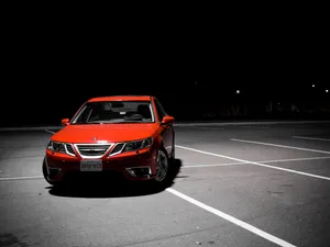 Dark Red Saab Sedan Wallpaper