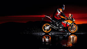 Dashing Orange Motorcycle Wallpaper