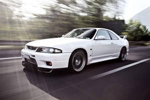 Dashing White Nissan Skyline Gtr R33 Wallpaper