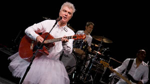 David Byrne Performing In Tutu Photo Wallpaper