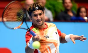 David Ferrer Executing A Forehand Stroke In A Match. Wallpaper