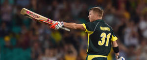 David Warner Holding Cricket Bat Wallpaper