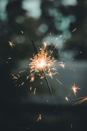 Dazzling Orange Sparkler Fireworks Stick Wallpaper