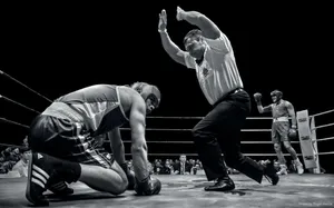 Decisive Moment - Vibrant Knock-out Punch In Boxing Wallpaper