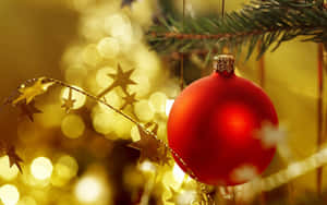 Decorate Your Christmas Tree With Magical Ornaments Wallpaper