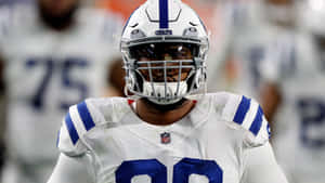 Deforest Buckner White Helmet And Football Jersey Wallpaper