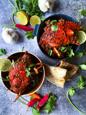 Delectable Singapore Chilli Crab In Two Bowls Wallpaper