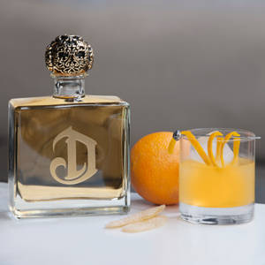 Deleón Tequila Drink With Orange Fruit Wallpaper