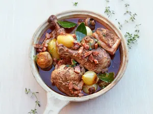 Delicious French Classic, Coq Au Vin In A Pan Wallpaper