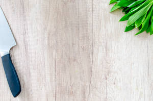 Delicious Ingredients Freshly Prepared On A Minimalist Wooden Cutting Board Wallpaper