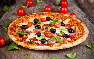 Delicious Pizza From Pizza Hut Wallpaper