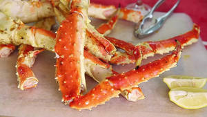 Delicious Red King Crab Freshly Cracked Open On A Serving Plate Wallpaper