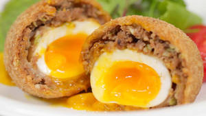 Delicious Traditional British Scotch Eggs Close-up Shot Wallpaper