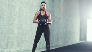 Demi Lovato With Medicine Ball Wallpaper