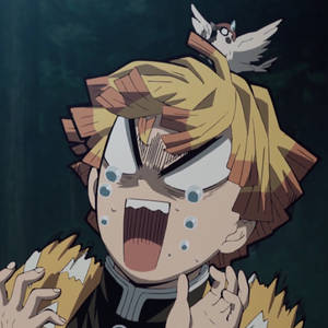 Demon Slayer Zenitsu Funny Face Wallpaper