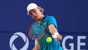 Denis Shapovalov Striking Tennis Ball Wallpaper