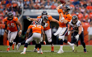 Denver Broncos In Action Wallpaper