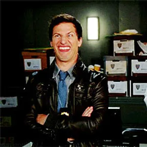 Detective Jake Peralta In Action Wallpaper