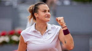 Determined Aryna Sabalenka Celebrating A Win Wallpaper