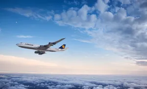 Deutsche Lufthansa Plane With A Panoramic Sky View Wallpaper