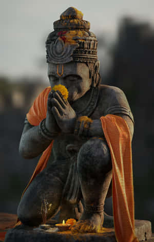 Devotional Hanuman Statue Praying Wallpaper