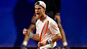 Diego Schwartzman And His Orange Racket Wallpaper