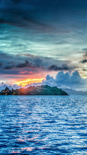 Distant Island Sunset Ocean Wallpaper