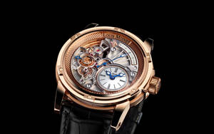 Distinguished Elegance - Louis Moinet Gold Watch Wallpaper