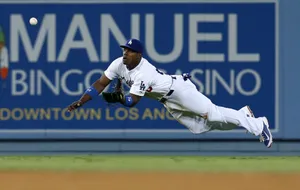 Dodgers Player Diving Catch Wallpaper