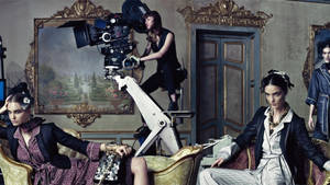 Dolce And Gabbana Models Posing With The Couch Wallpaper