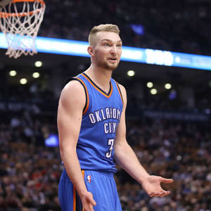 Domantas Sabonis Blue And Orange Jersey Wallpaper