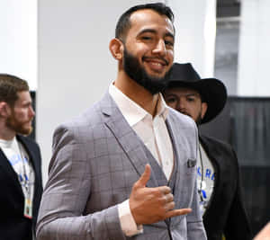 Dominick Reyes Smiling Thumbs Up Wallpaper