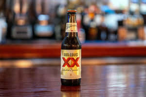 Dos Equis Beer Bottleon Bar Wallpaper