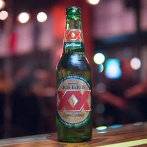 Dos Equis Beer Bottleon Bar Wallpaper