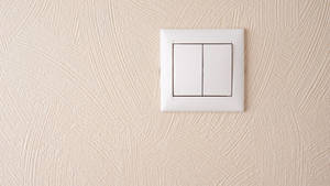 Double Light Switch Wall Wallpaper